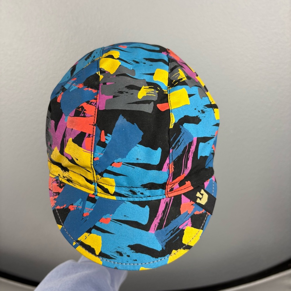 Goorin Bros Multicolor Abstract Print Cycling Cap - Blue, Yellow, Pink, Black